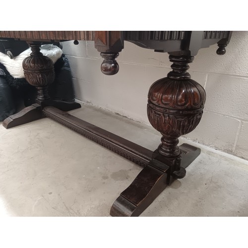 676 - A large vintage refectory style dining table on large ornately carved bulbous frame