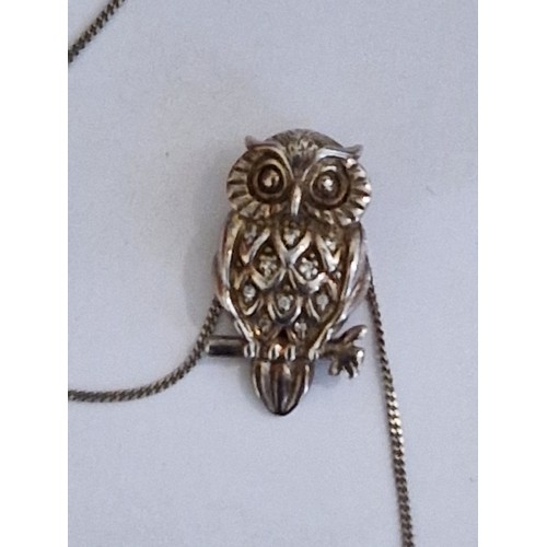 398 - Silver stamped necklace with owl pendant stamped 925