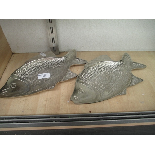 297 - A pair of plated metal fish shaped trays