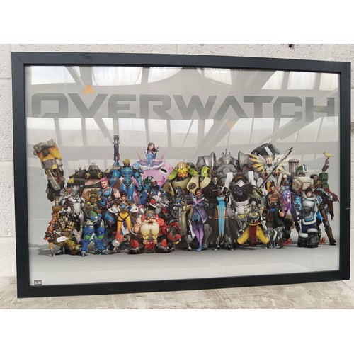 268 - A large framed OVERWATCH poster