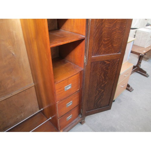 651 - A vintage 2 door oak wardrobe with fitted internal drawers