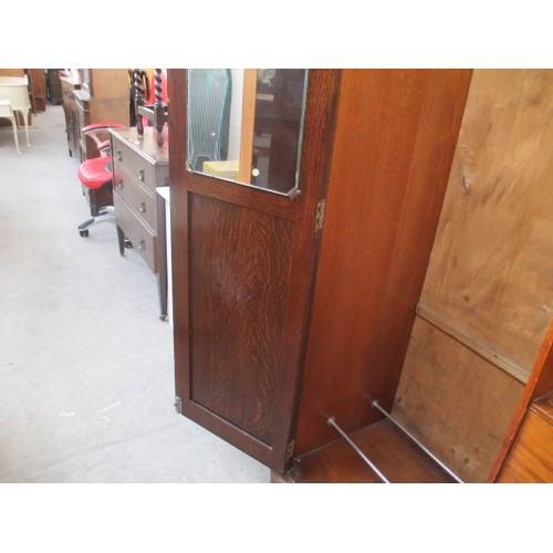 651 - A vintage 2 door oak wardrobe with fitted internal drawers