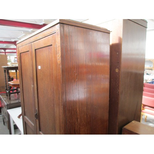 651 - A vintage 2 door oak wardrobe with fitted internal drawers