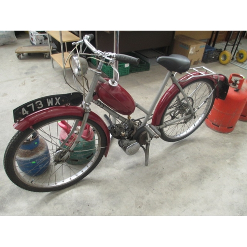 300 - Vintage The Raleigh 50cc bike with Sturmey Archer engine and original reg plate. In very good condit... 