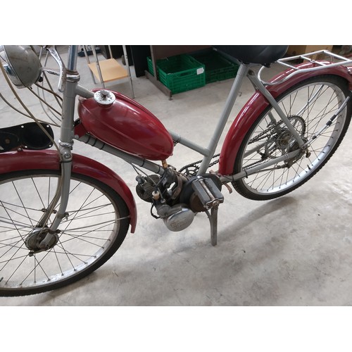 300 - Vintage The Raleigh 50cc bike with Sturmey Archer engine and original reg plate. In very good condit... 