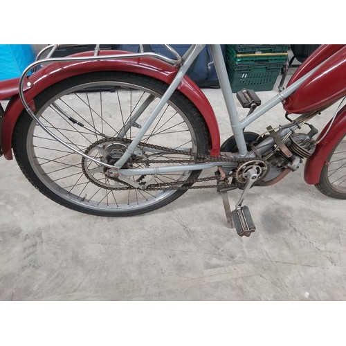 300 - Vintage The Raleigh 50cc bike with Sturmey Archer engine and original reg plate. In very good condit... 