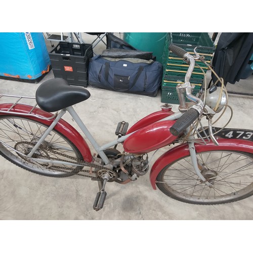 300 - Vintage The Raleigh 50cc bike with Sturmey Archer engine and original reg plate. In very good condit... 