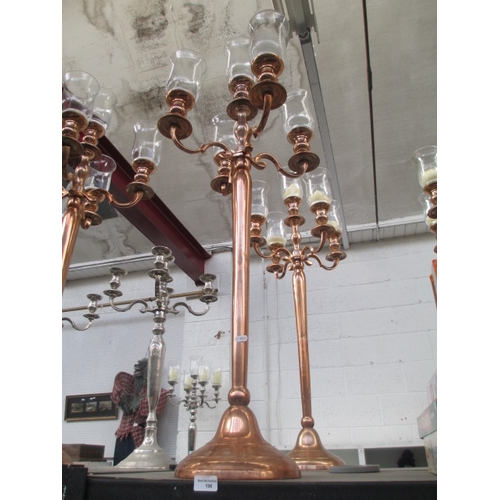 196 - Five arm Rose Gold coloured candelabra with storm glasses