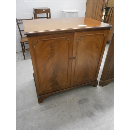 648 - A large vintage 2 door TV cabinet - af top