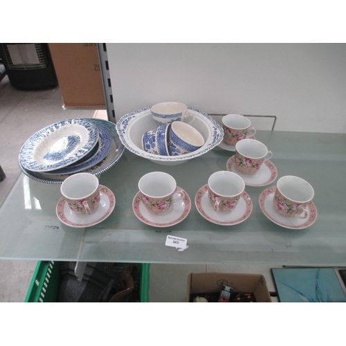 303 - Lot inc blue & white pottery and floral cups & saucers