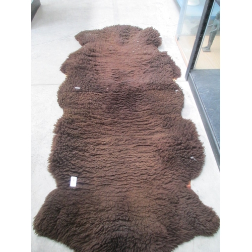 450 - Sheepskin type brown rug