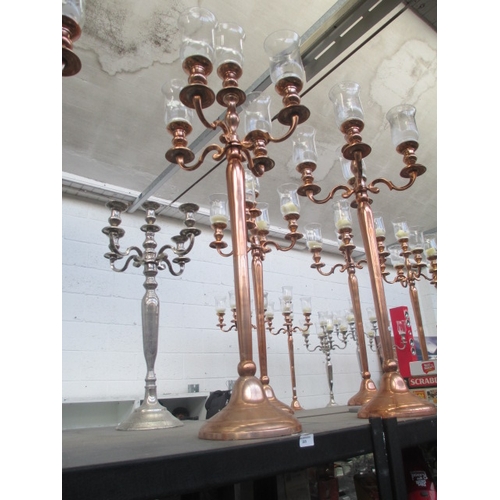 205 - Five arm Rose Gold coloured candelabra with storm glasses