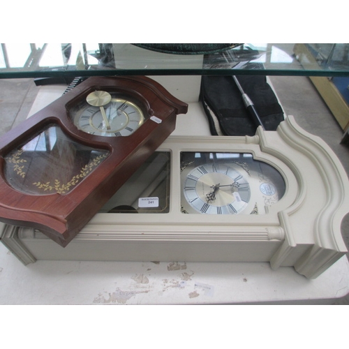 241 - Two assorted wall mounted clocks