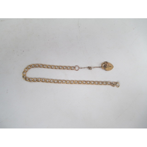 280 - 9ct gold chain and padlock pendant, weight 2.5 grams