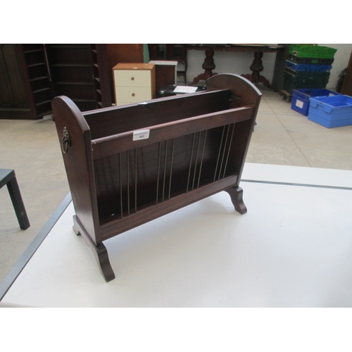 602 - A vintage mahogany magazine rack