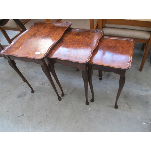 605 - A vintage nest of 3 x walnut occasional tables