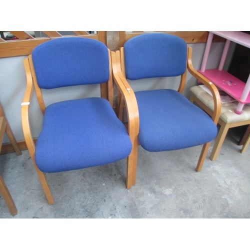 609 - A pair of wood framed stacking waiting room chairs