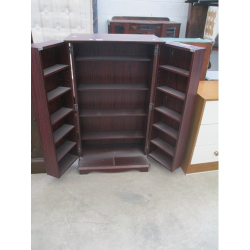 621 - A vintage fold out 2 door storage cabinet