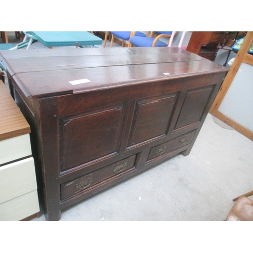 628 - A large Antique Oak lift top coffer with 2 x lower drawers and ornately carved rear panels