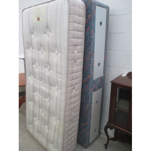 633 - A 2 drawer divan single bed with mattress