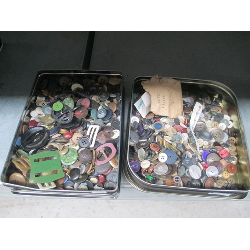 317 - Two tins of assorted old buttons