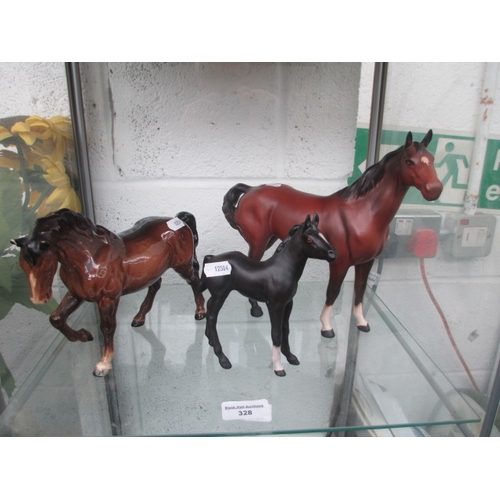 328 - Three horse figurines two Beswick and Royal Doulton