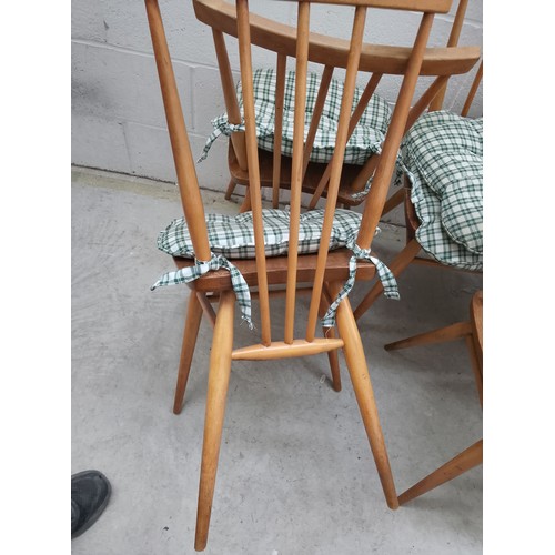 629 - A set of 4 x ERCOL Model 391 dining chairs with cushions