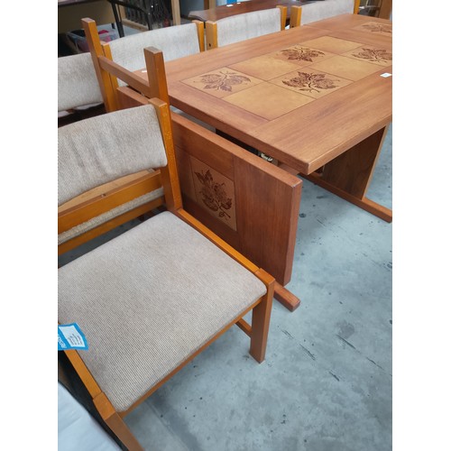 610 - A retro FARSTRUP Danish dining set with large tile top drop leaf table and 6 x chairs