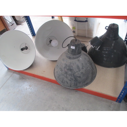 427 - Four industrial enamel lampshades