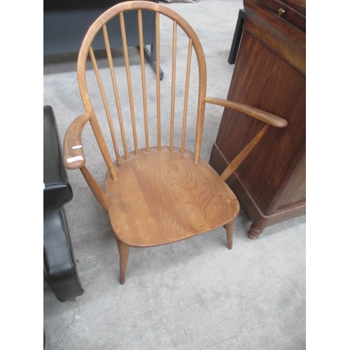 636 - Ercol low seated spindle back armchair