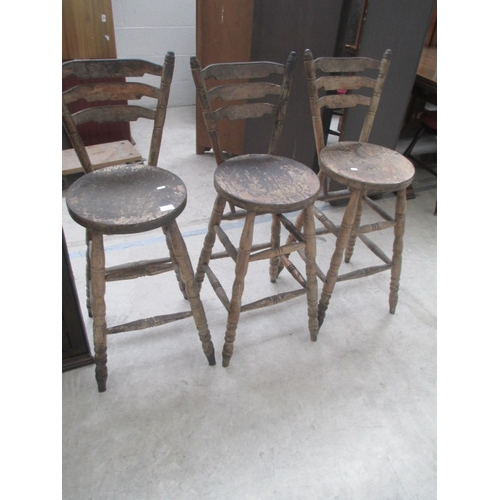 639 - Three old tall bar stools