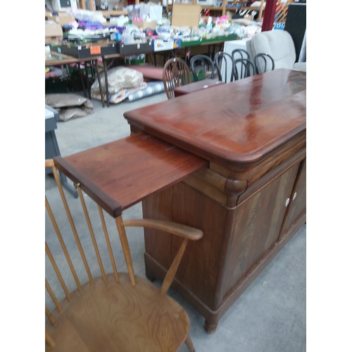 635 - 19th century mahogany buffet with slide out sides and drop top with fold in shelves