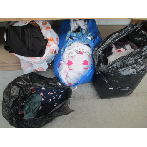 8 - Four bags of assorted clothing