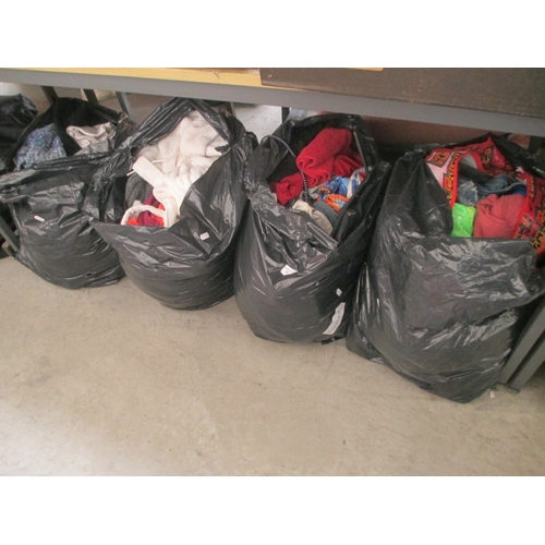 85 - Four bags of assorted clothing