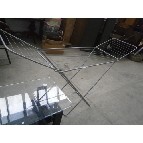 613 - A folding metal drying rack