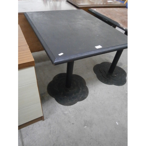 633 - A vintage square pub style table on metal pedestal