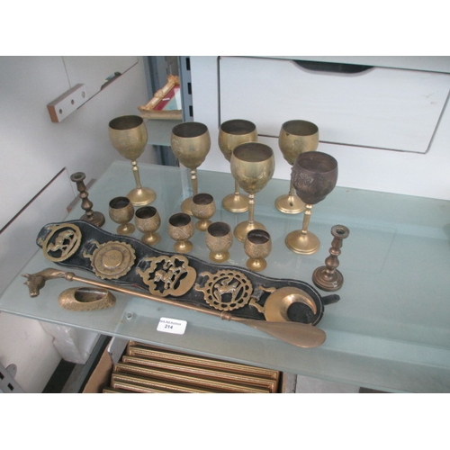 214 - Collection of brassware inc candlesticks, horse brasses, etc