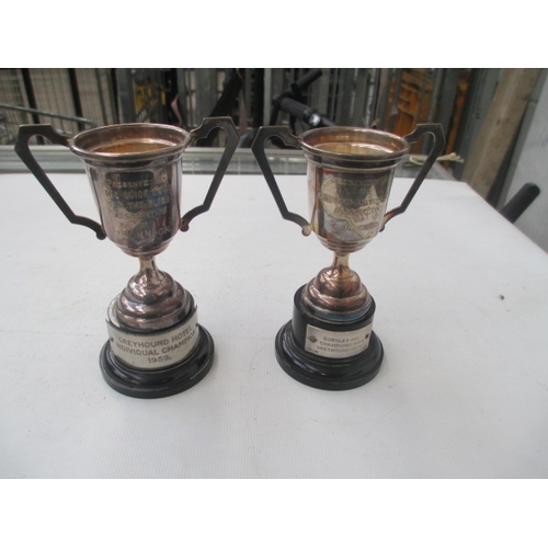 255 - Two silver hallmarked trophies, weight without bases 78 grams