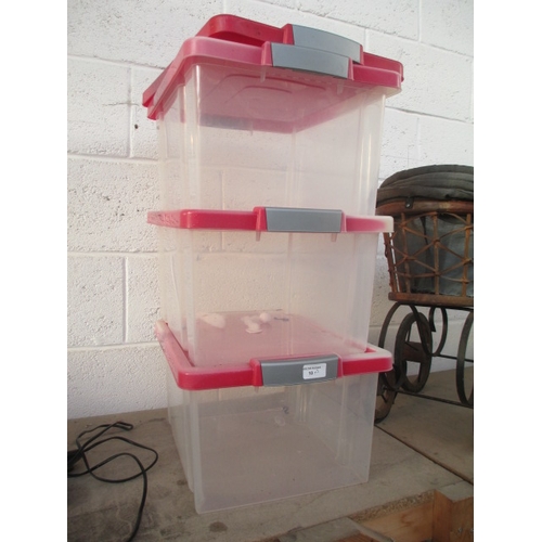 10 - Three plastic storage boxes with lids