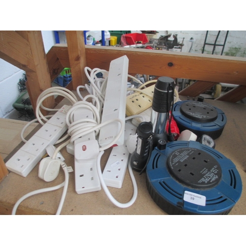 39 - Lot inc extension sockets, extension reels and three torches