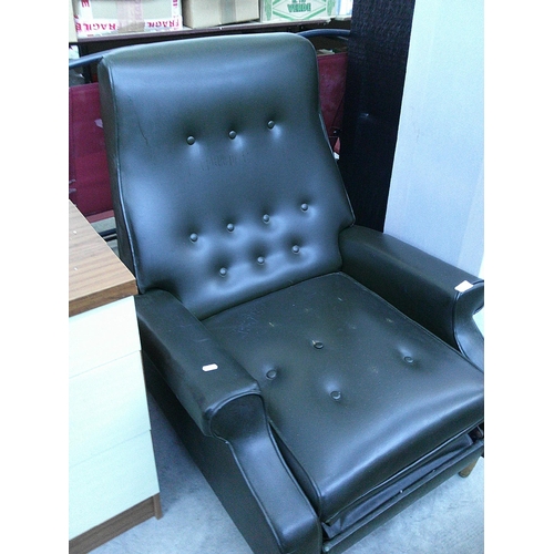 610 - A vintage faux leather recliner armchair - some missing buttons