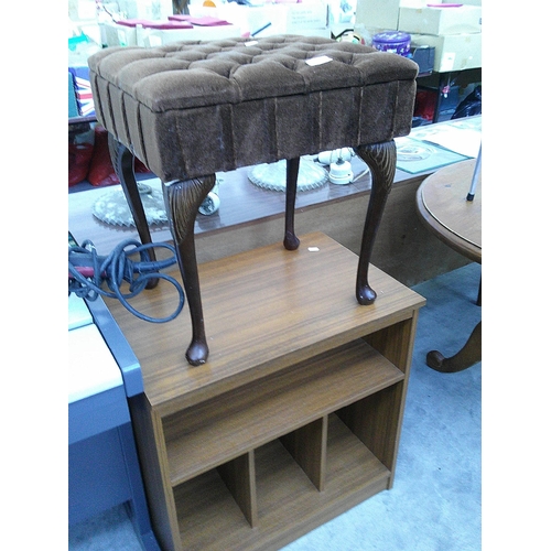 614 - A vintage upholstered lift top storage stool and a small storage unit