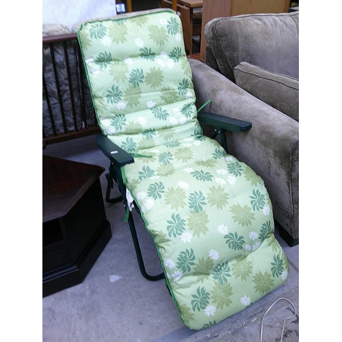 627 - A folding Sun Lounger with cushions