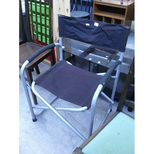 630 - A folding metal framed garden chair