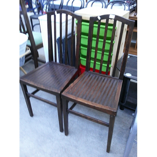 631 - A pair of vintage stand chairs with solid seats