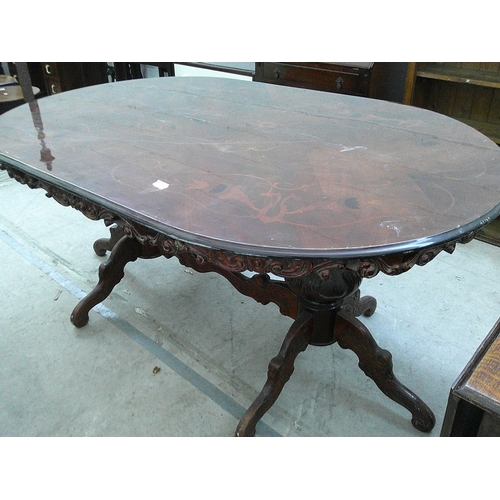 639 - A large inlaid continental style twin pedestal dining table