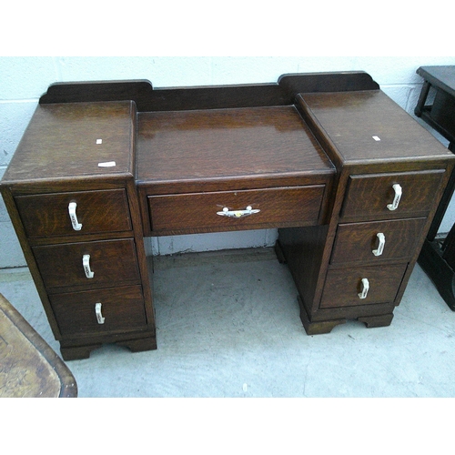 646 - A vintage 7 drawer drop centre dressing chest