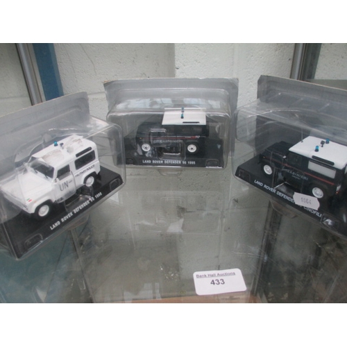 433 - Three assorted diecast cars