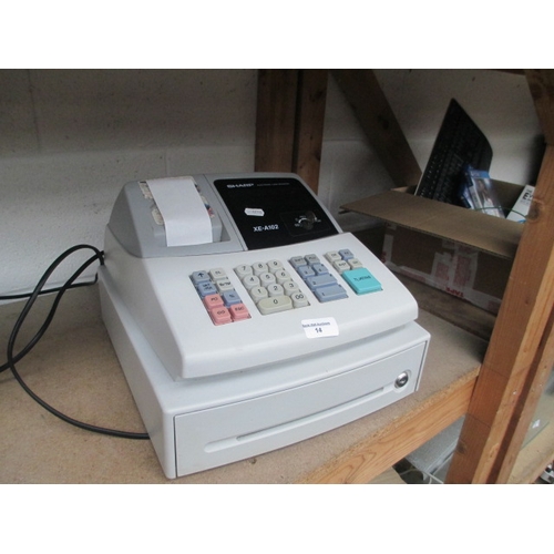 14 - Sharp electronic cash register, powers up