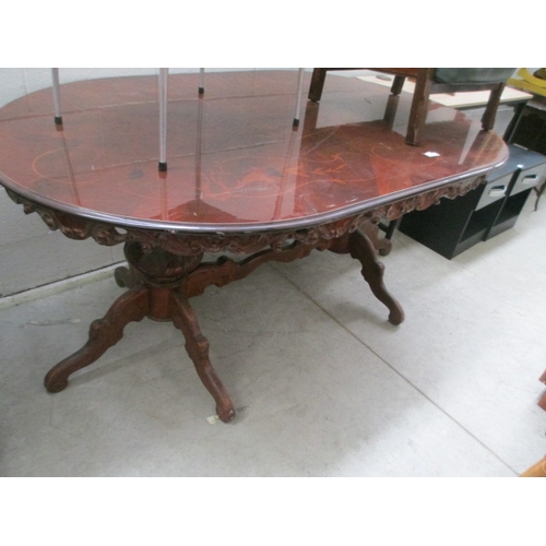 644 - A large continental style inlaid dining table on carved bulbous supports